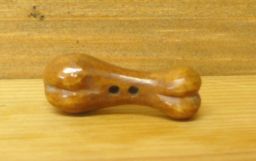 Hand carved - bone shaped - Button