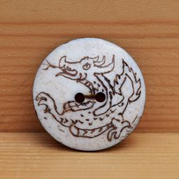 Inscribed dragon - bone button