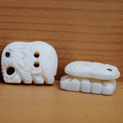 Hand carved - small elephant - button